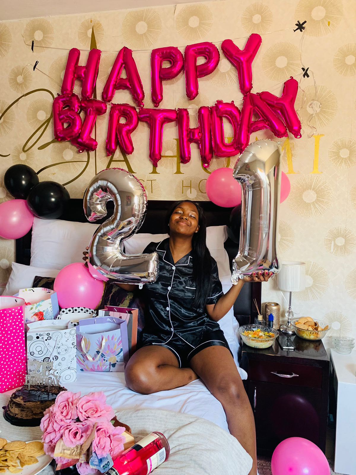 21st birthday celebration with balloons, cake and gifts at Bahumi Guesthouse