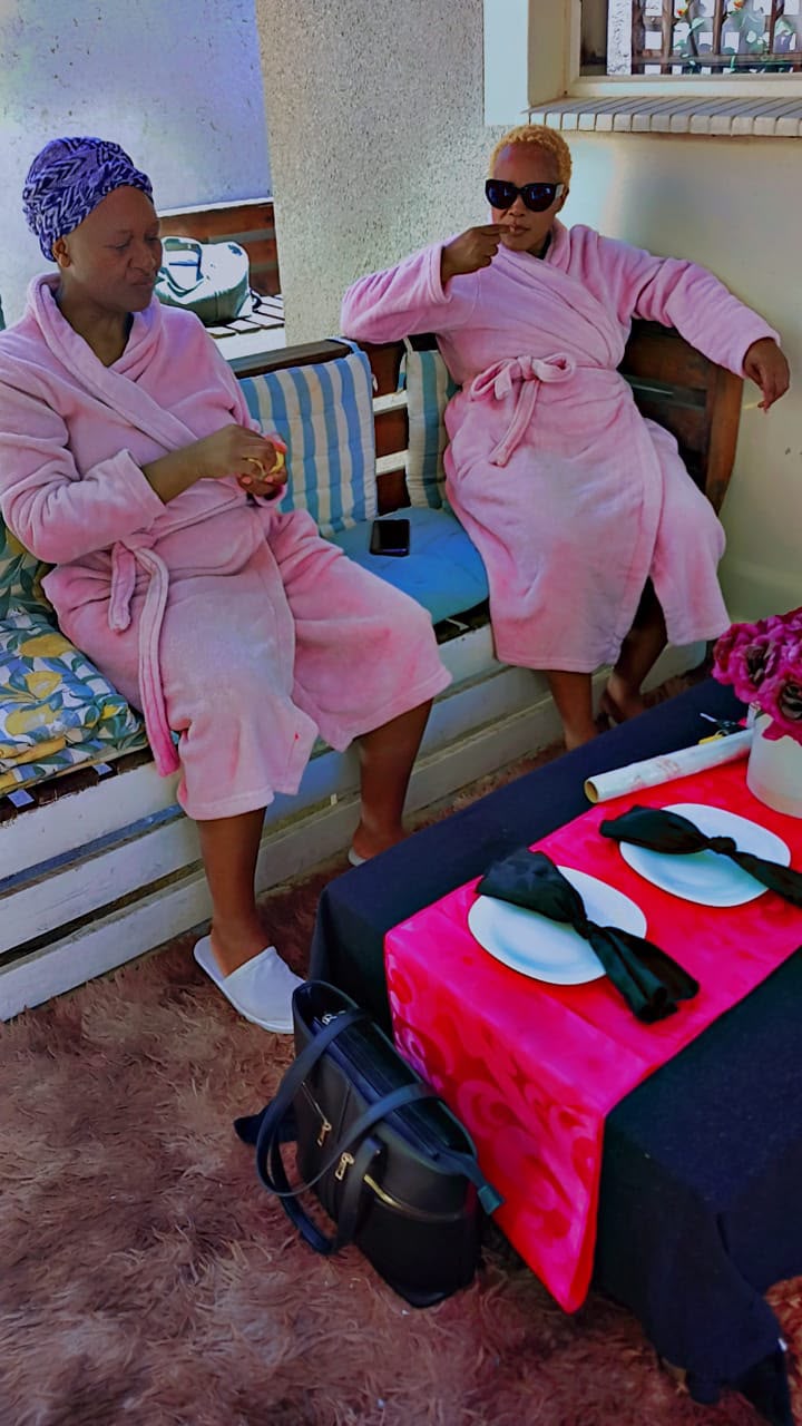 Guests enjoying a pampering spa morning on the patio at Bahumi Guesthouse